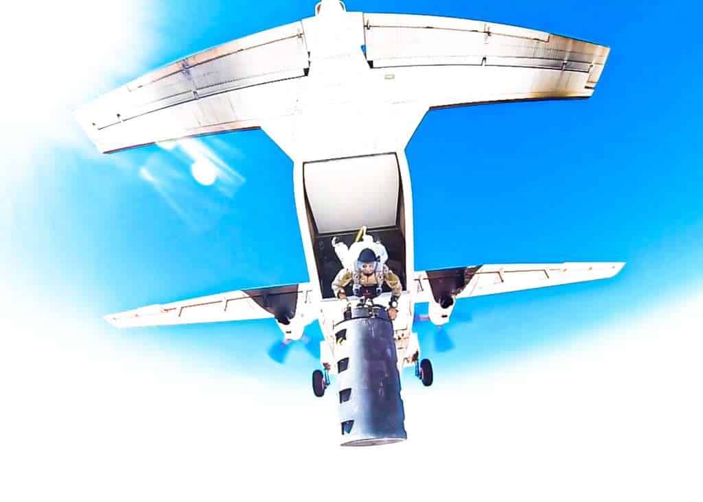 Nathan Spearing parachuting from a military aircraft during special operations service